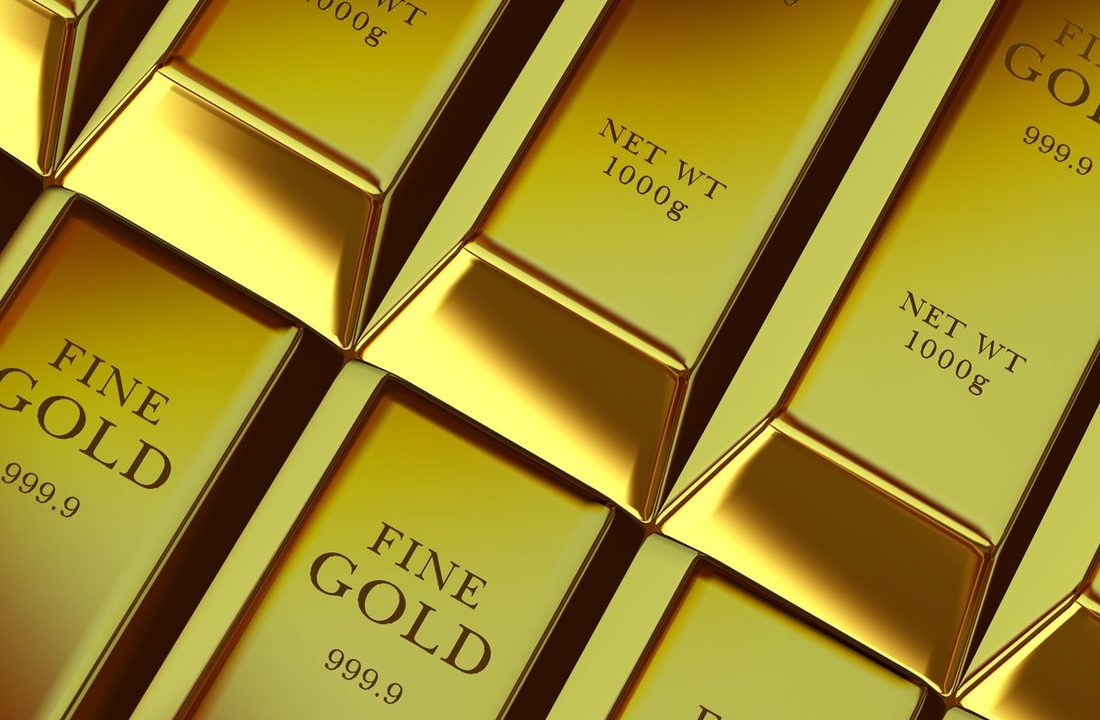 Stacked one-kilo fine gold bars